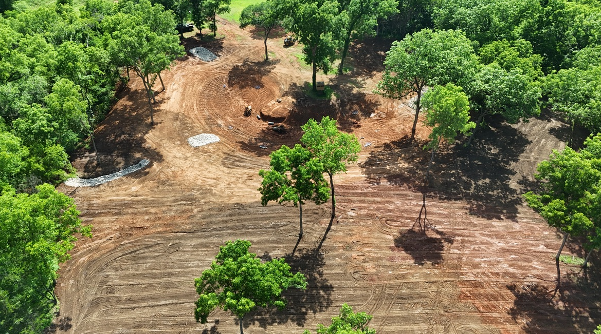 Cleared and shaped pond site during excavation